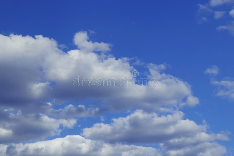 Approaching Storm on Blue Sky. Bad Weather is Coming Stock Photo