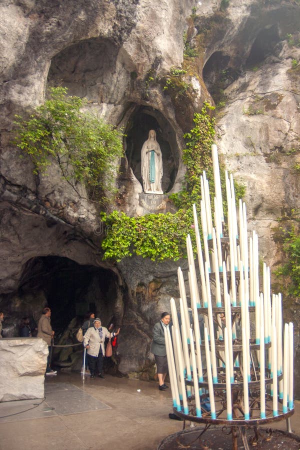 Candles in Front of the Cave at Massabielle in Lourdes Editorial Stock ...