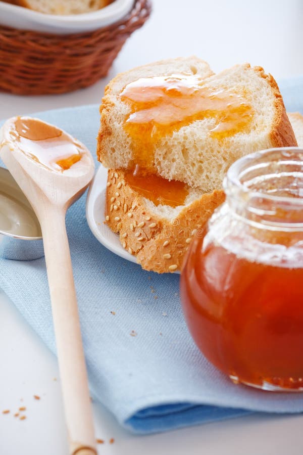 Delicious Apricot Jam on a Slice of Bread with Butter Stock Image