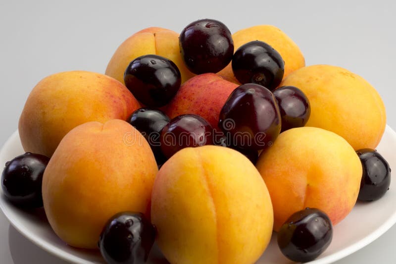 Apricots and cherries stock image. Image of berries, luscious 25214039