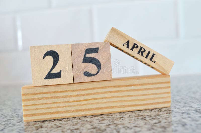 Calendar. April 25th. Wood Cube Calendar with Date of Month and