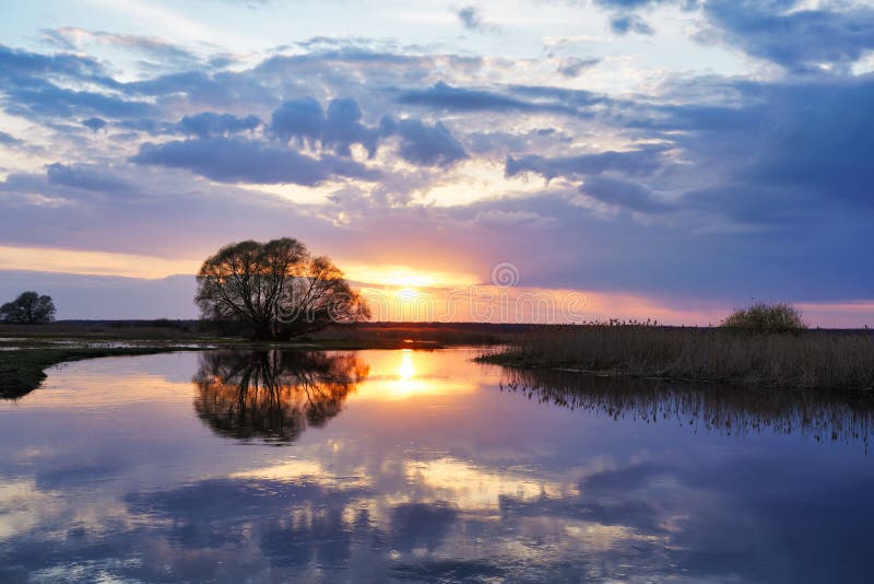 April sunset over water, early spring landscape over Biebrza royalty free stock photos