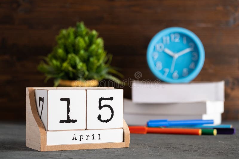 April 15th. April 15 wooden cube calendar royalty free stock photos