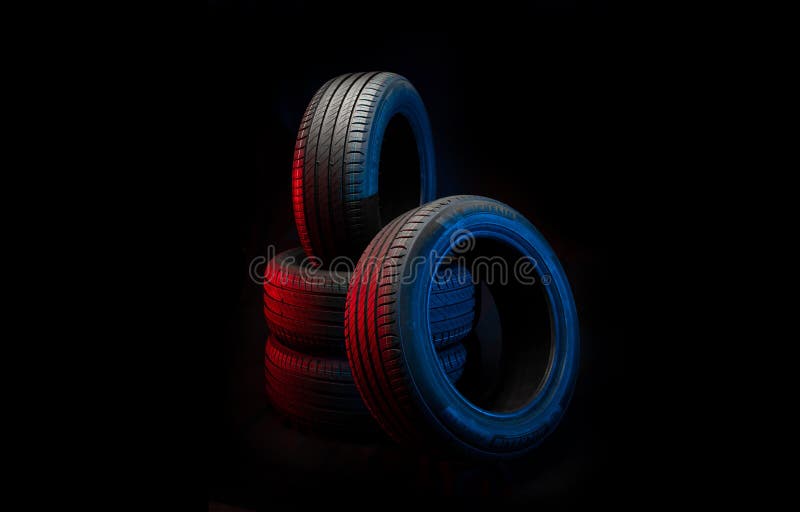 09 of April 2022 - Vinnitsa, Ukraine. New car tires Michelin Primacy 4 plus. Road wheels on dark background