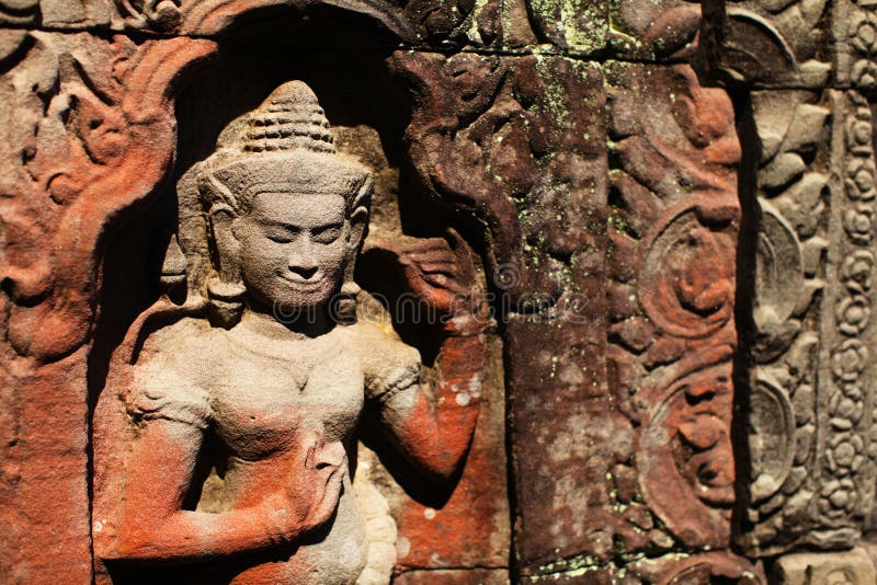 Apsara carved on temple wall in Siem Reap, Cambodi