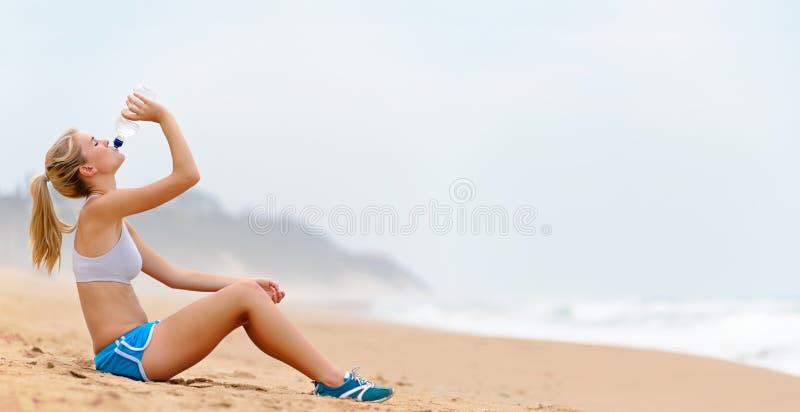 High detail panoramic image of fitness girl drinking water - XXL image. High detail panoramic image of fitness girl drinking water - XXL image