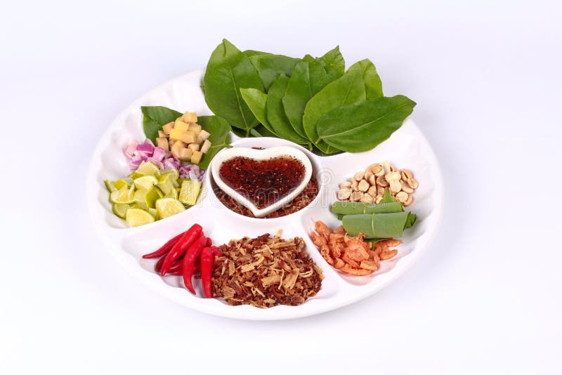 Apéritif Feuille-enveloppé de Morsure-taille, Miang Kum image stock Apéritif Feuille-enveloppé de Morsure-taille, Miang Kum image stock
