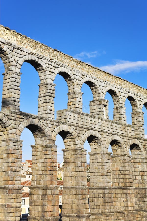 The aqueduct and ancient Segovia stock images