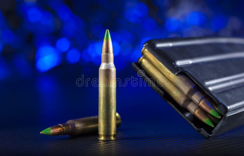 AR15 Ammo and Magazine with Blue Background Stock Photo Image of