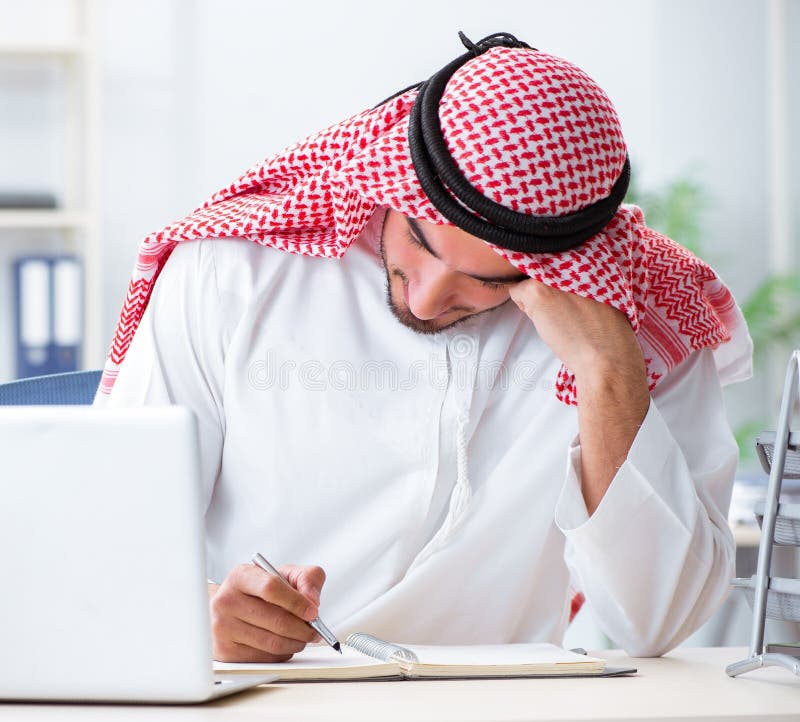 Arab businessman working in the office stock image
