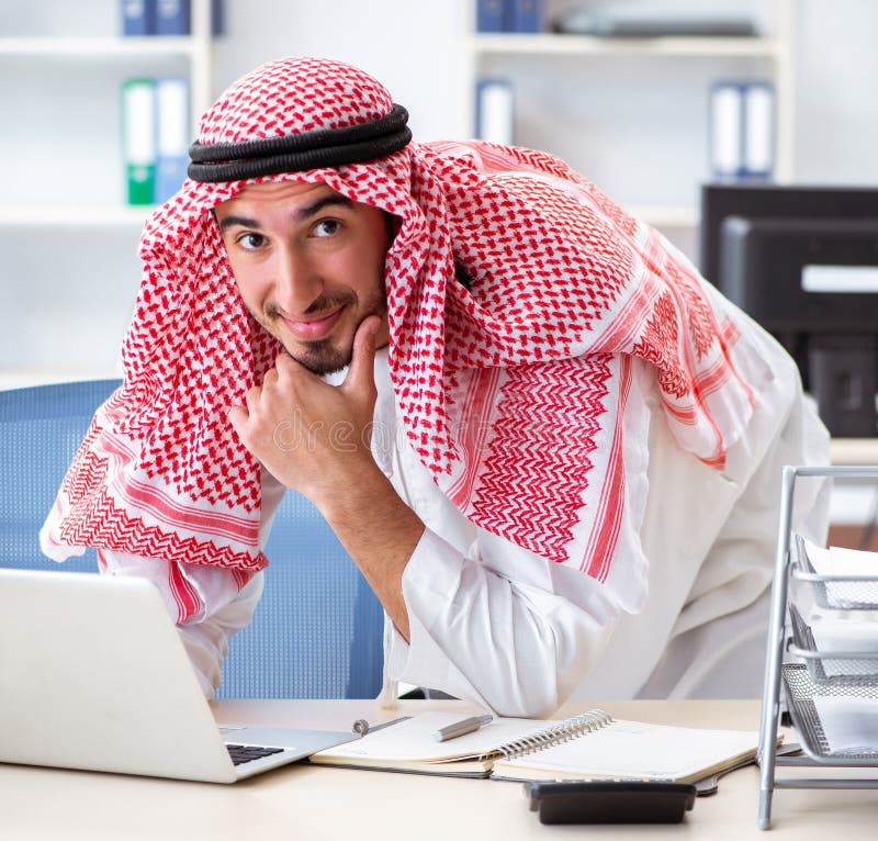 Arab businessman working in the office royalty free stock photography