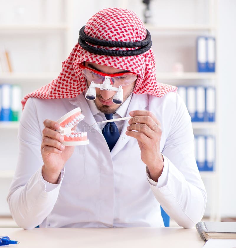 Arab Dentist Working On New Teeth Implant Stock Image Image of arab