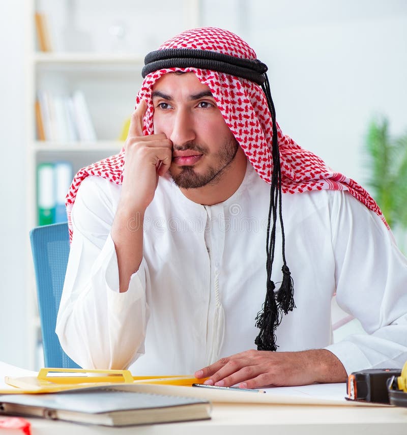 Arab engineer working on new project royalty free stock photos