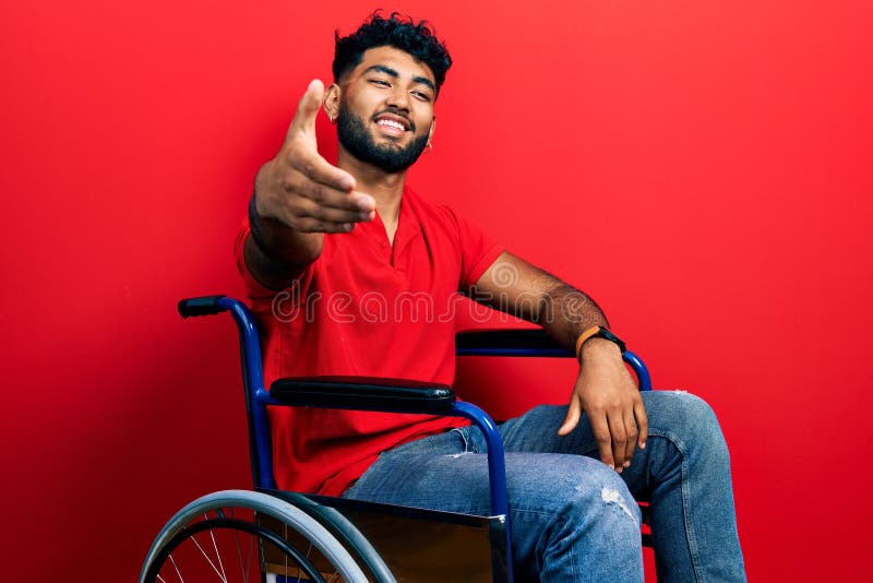 Arab Man with Beard Sitting on Wheelchair Smiling Friendly Offering