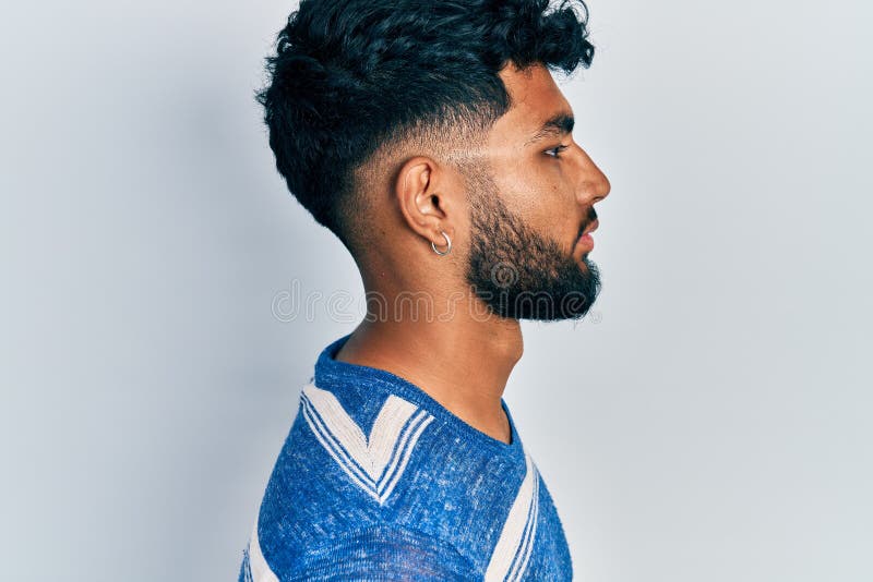 Arab Man with Beard Wearing Casual Striped T Shirt Looking To Side, Relax Profile Pose with Natural Face with Confident Smile Stock Image - Image of hair, model: 229518611 Arab Man with Beard Wearing Casual Striped T Shirt Looking To Side, Relax Profile Pose with Natural Face with Confident Smile Stock Image - Image of hair, model: 229518611