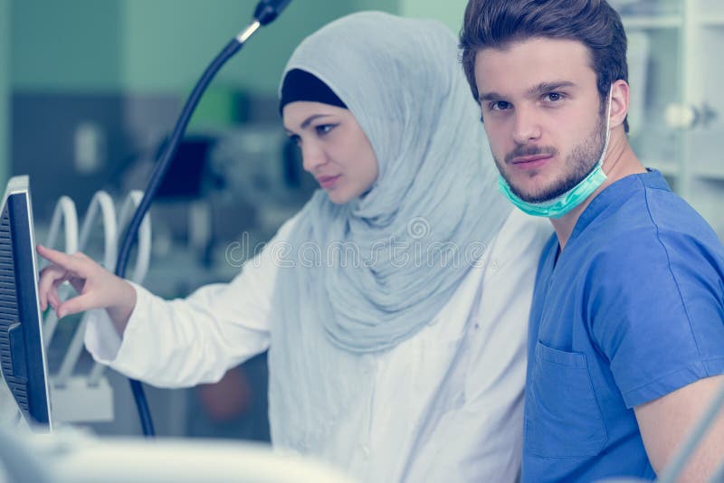 Arab Students with Hijab while Working on the Denture, False Teeth