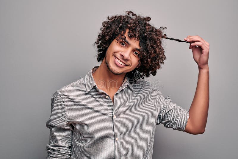 Arabian Man Shows His Healthy Beautiful Curly Hair Stock Image - Image