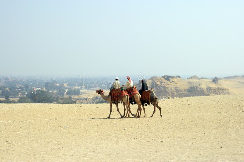 Arabian men in desert