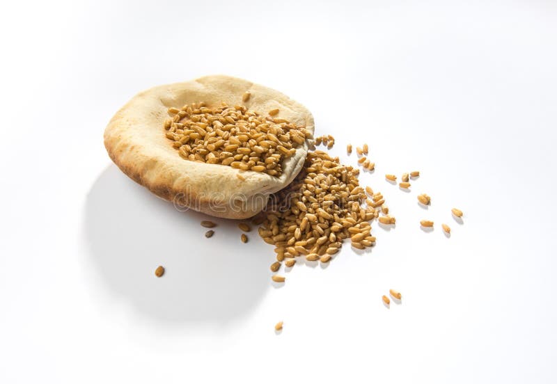 Arabic bread and wheat. stock image. Image of bakery 53702653