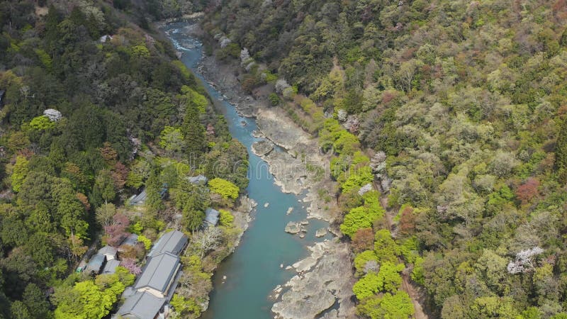 Arashiyama Aerial view of valley in spring, Katsura river flowing in Kyoto, Japan