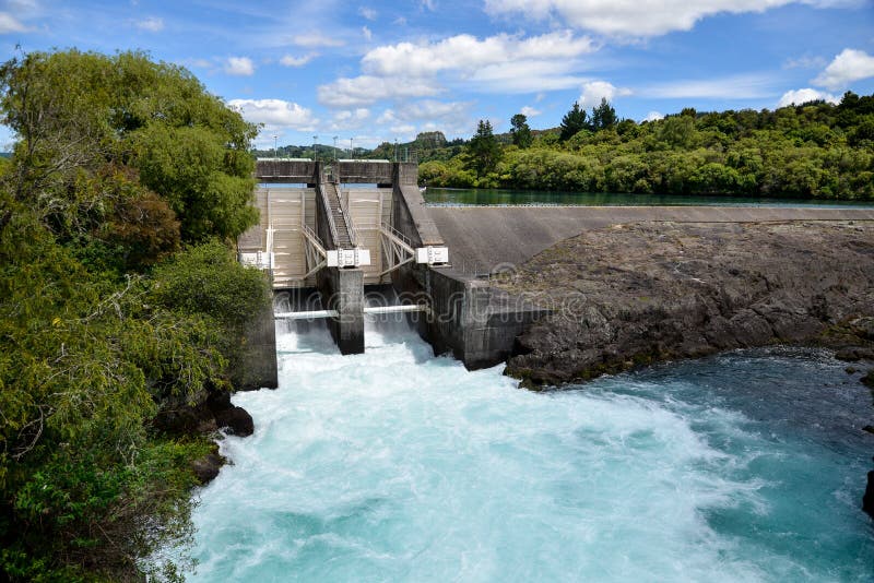 Aratiatia Rapids dam on Waikato river opened with water breaking thru, New Zealand, North Island. Aratiatia Rapids dam on Waikato river opened with water breaking thru, New Zealand, North Island