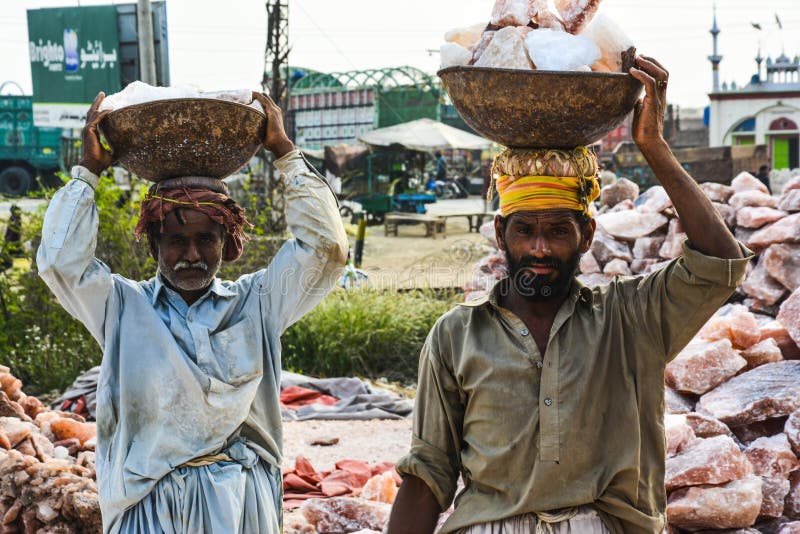 Laborers carrying rock salt - Natural lamps are famous all over the world for their unique beautiful light. These salt lamps emit colorful apricot, yellow & orange light. These are carefully crafted from rock salt taken from mines in Salt Range Mountain located near Quaidabad, Khushab, Pakistan. Natural salt lamps are used to decorate drawing rooms, offices & bedrooms. It ionizes and purifies the air which can be very healthful for asthma & patients with joint pains. Today, the health benefits of ionizers are well recognized; whilst most ionizers in the market are manmade, the crystal salt lamps are Mother Nature`s beautiful alternative. Laborers carrying rock salt - Natural lamps are famous all over the world for their unique beautiful light. These salt lamps emit colorful apricot, yellow & orange light. These are carefully crafted from rock salt taken from mines in Salt Range Mountain located near Quaidabad, Khushab, Pakistan. Natural salt lamps are used to decorate drawing rooms, offices & bedrooms. It ionizes and purifies the air which can be very healthful for asthma & patients with joint pains. Today, the health benefits of ionizers are well recognized; whilst most ionizers in the market are manmade, the crystal salt lamps are Mother Nature`s beautiful alternative.