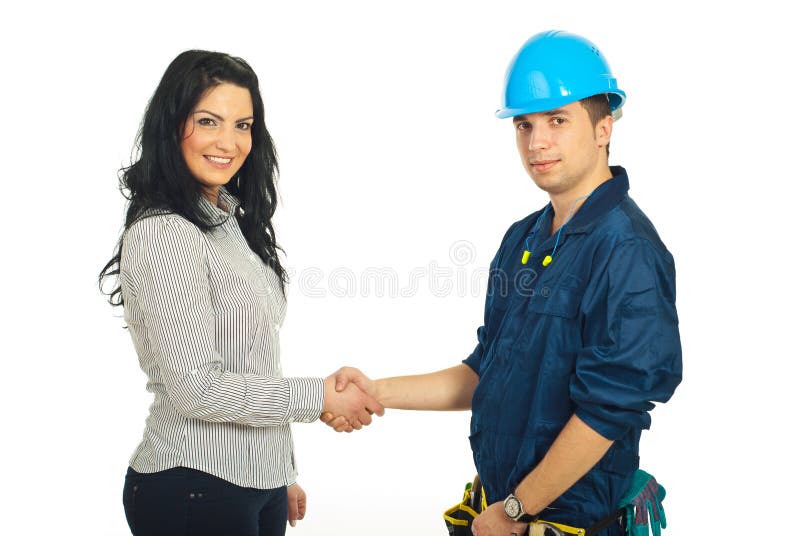 Happy constructor worker man and client woman giving handshake isolated on white background. Happy constructor worker man and client woman giving handshake isolated on white background