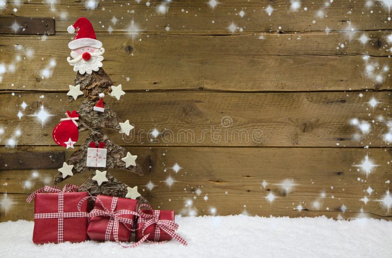 Arbre de Noël avec des présents et des flocons de neige de rouge. image stock Arbre de Noël avec des présents et des flocons de neige de rouge. image stock