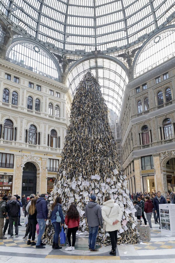 Naples, Italy - December 16, 2018: In the Umberto I Gallery the traditional Christmas tree is exhibited, where each person expresses their desires with a message, a wish, which is hung on the Christmas tree. Naples, Italy - December 16, 2018: In the Umberto I Gallery the traditional Christmas tree is exhibited, where each person expresses their desires with a message, a wish, which is hung on the Christmas tree