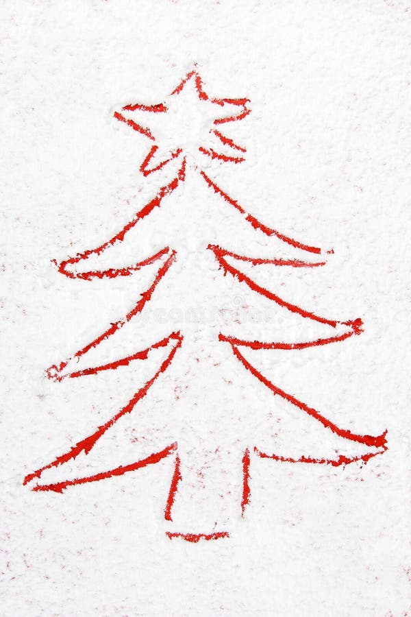 Outline of red christmas tree drawn in the snow. Outline of red christmas tree drawn in the snow