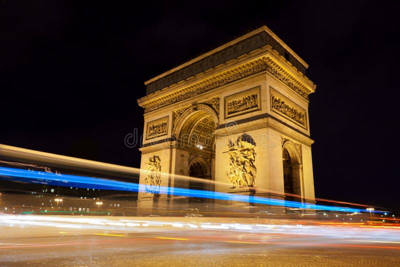 Arc DE Triomphe 's nachts in Parijs, Frankrijk royalty-vrije stock foto Arc DE Triomphe 's nachts in Parijs, Frankrijk royalty-vrije stock foto