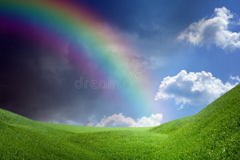 Arc-en-ciel au-dessus des collines vertes images stock Arc-en-ciel au-dessus des collines vertes images stock