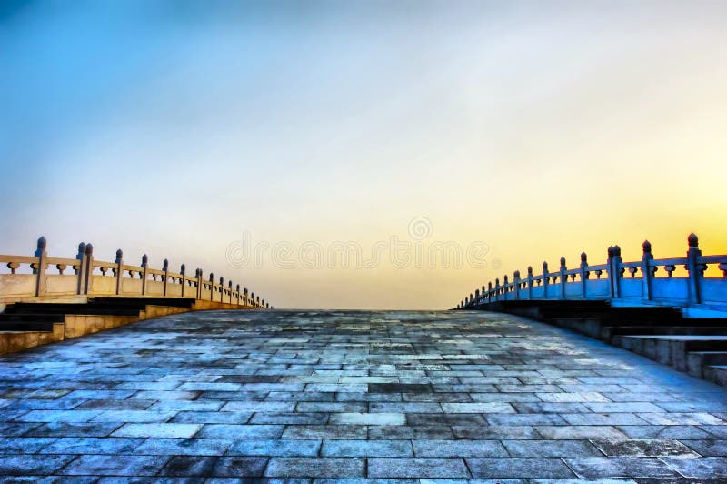 Arch bridge at sunset time