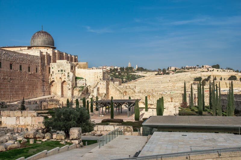 Archaeological park near the walls of Jerusalem, Israel with Al Aqsa Mosque and the jeus graveyard in the backfround stock photo Archaeological park near the walls of Jerusalem, Israel with Al Aqsa Mosque and the jeus graveyard in the backfround stock photo