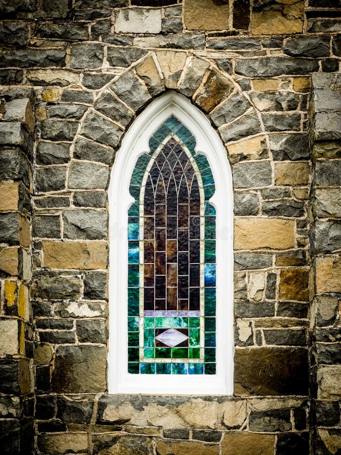 Arched Stained Glass Window In Stone Wall Stock Photo Image 68600942