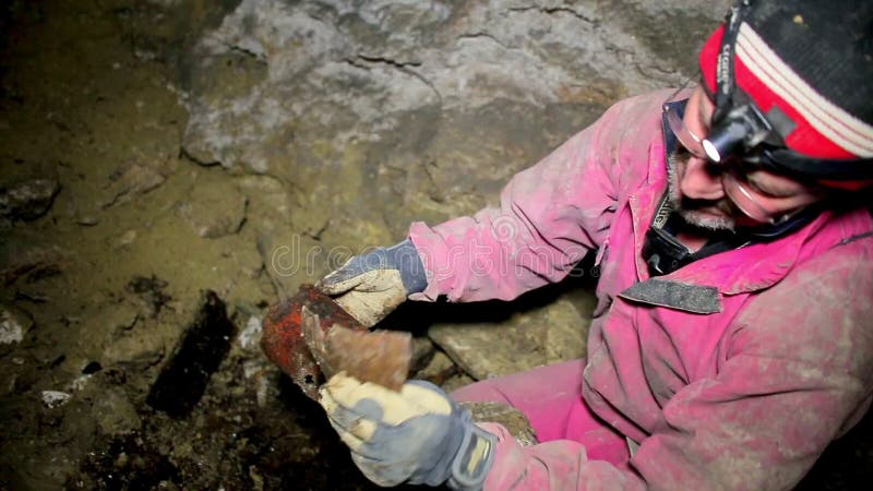 Archeology looking at a archaeological find