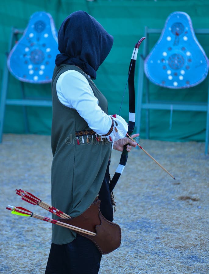 Archery Trainings, Shots and Traditional Local Outfits Stock Image