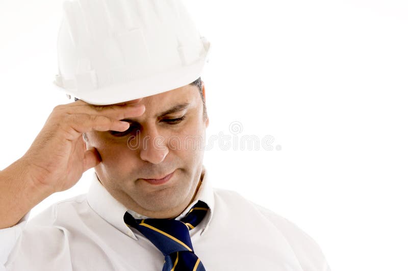 Architect holding his head in pain