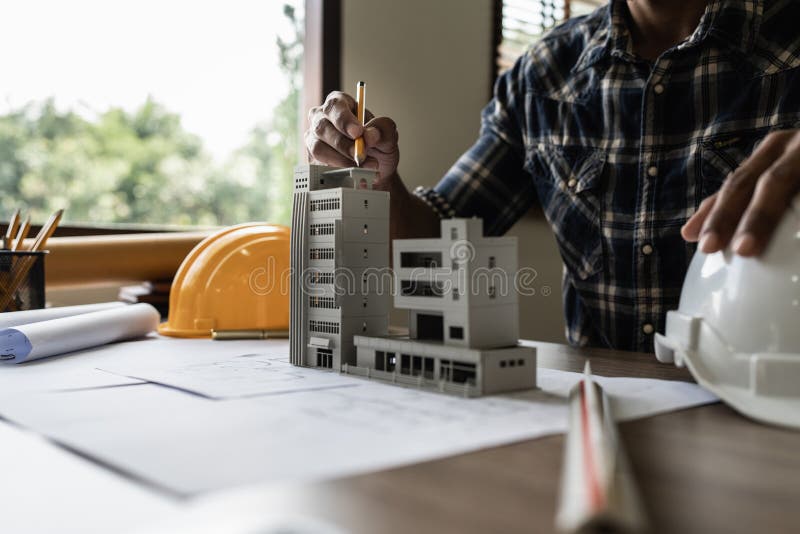 Architect Man Working with Blueprints for Architectural Plan, Engineer