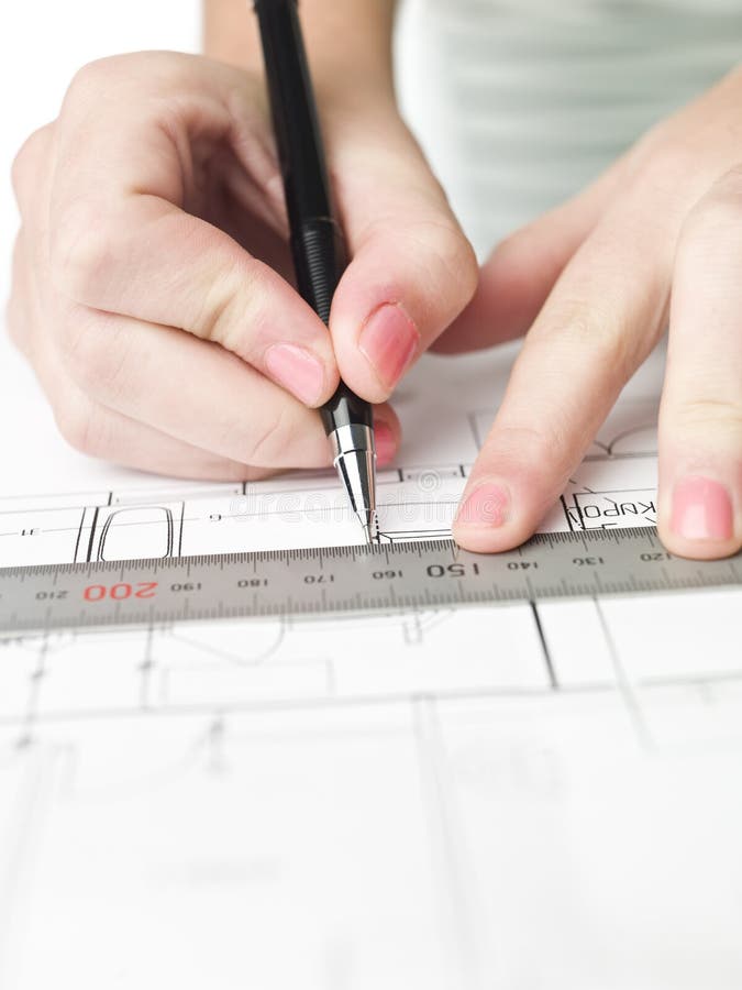 Architect working on a bluprint royalty free stock photo