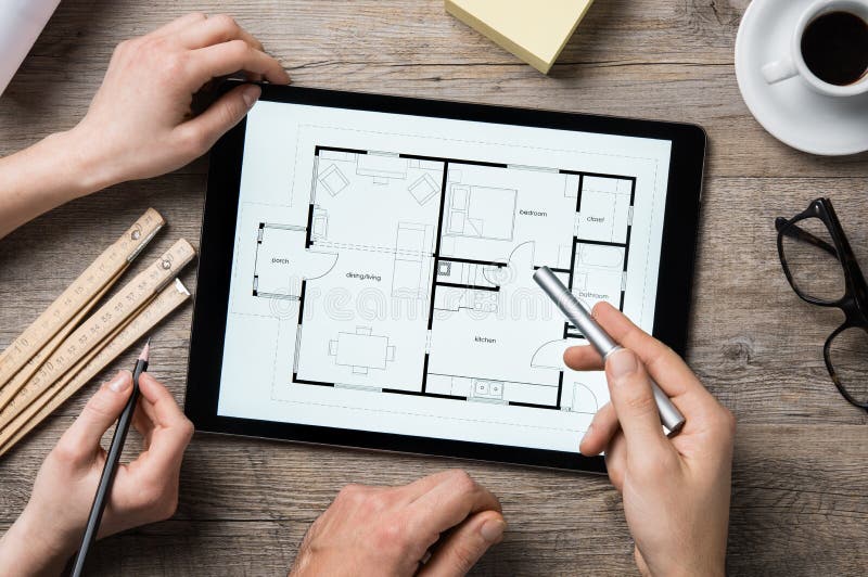Architect working on digital tablet royalty free stock images