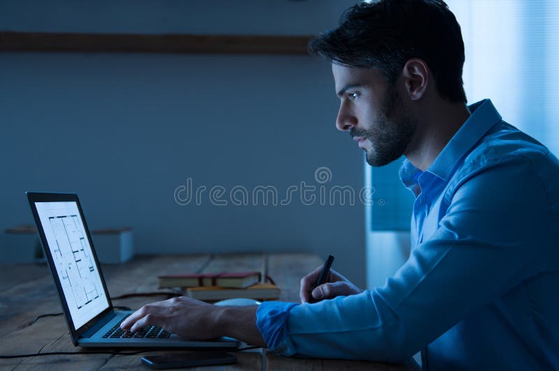 Architect working on laptop royalty free stock image