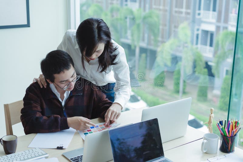 Architects choosing color samples for design project,creative graphic design. royalty free stock photography Architects choosing color samples for design project,creative graphic design. royalty free stock photography