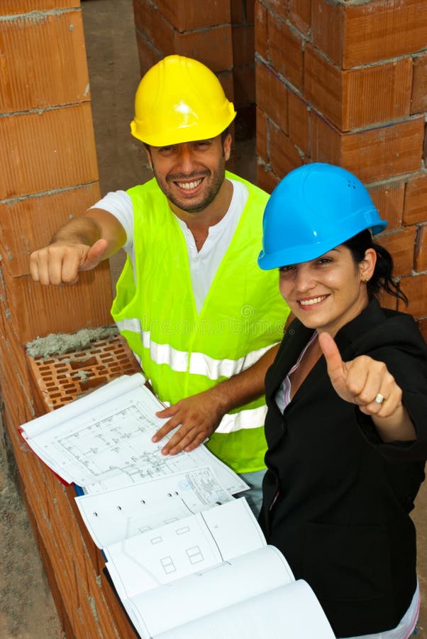 Architects on site giving thumbs up