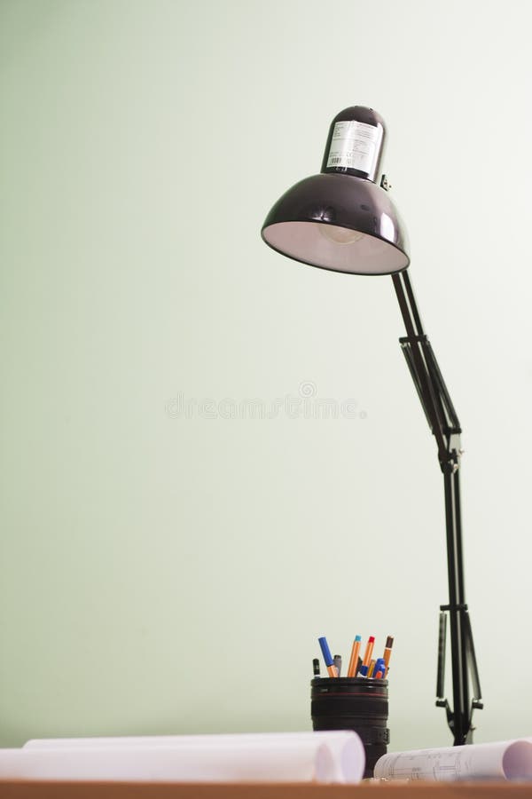 Architectural blueprints and blueprint rolls and a drawing instruments royalty free stock images