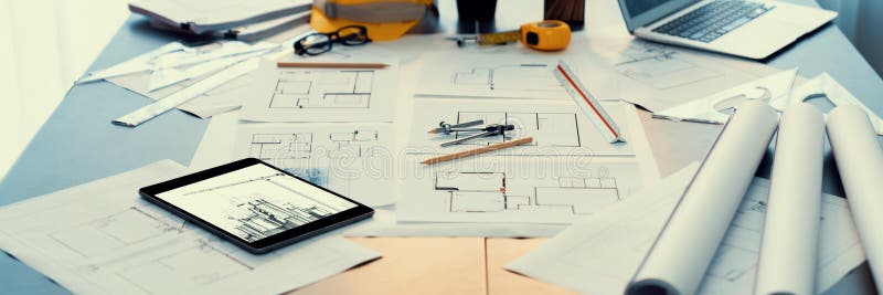 Architectural designed blueprint layout and engineer tools on table. Insight royalty free stock photo