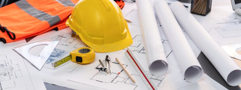 Architectural designed blueprint layout and engineer tools on table. Insight stock photography
