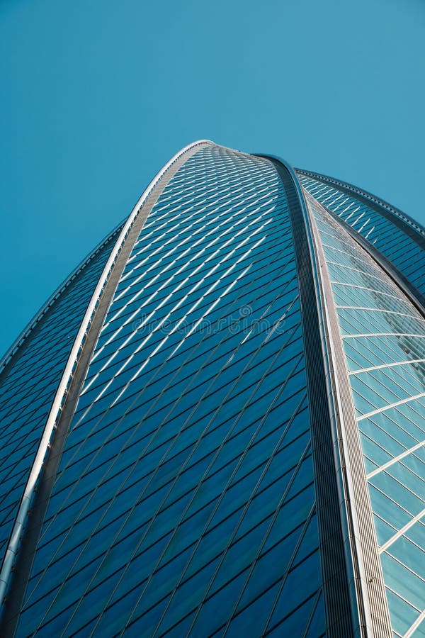 An Architectural Marvel A Unique Perspective on a Stunning, Inspiring Modern Skyscraper royalty free stock image