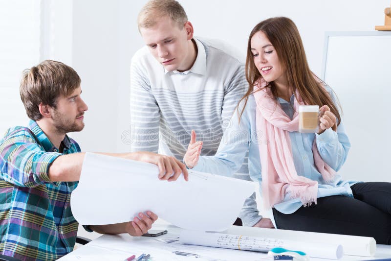 Architectural team working together royalty free stock photography