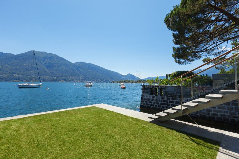 Architecture external platform on the lake with garden